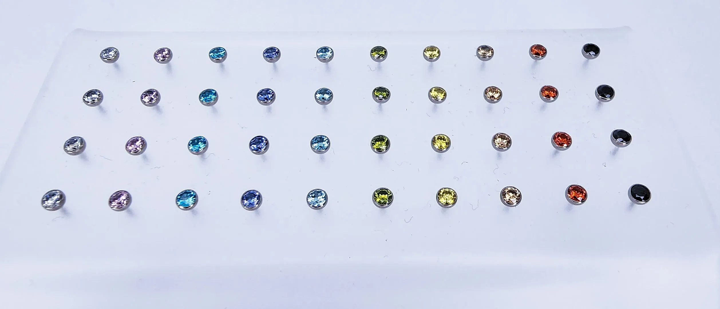 Titanium threadless beads,5A Cubic zirconia. Over 75k pieces sold last yr!!